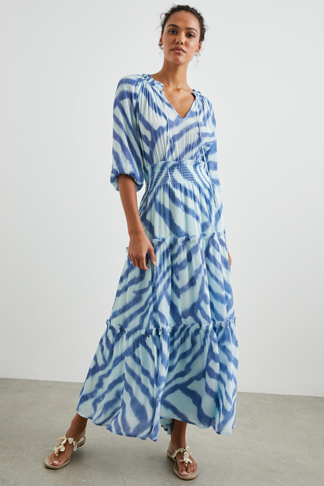 Blue and white striped tie dye effect maxi tiered dress with notch neck and ruched waistline with ruffle details throughout