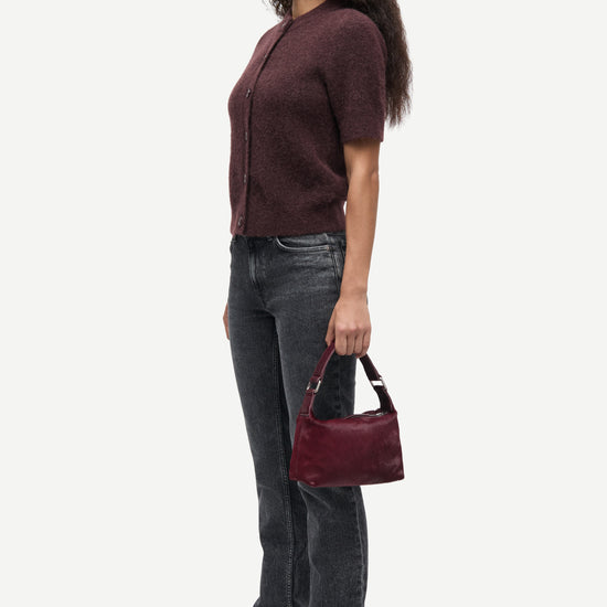 short sleeve dark burgundy wool mix cardigan with burgundy buttons from samsoe samsoe side view