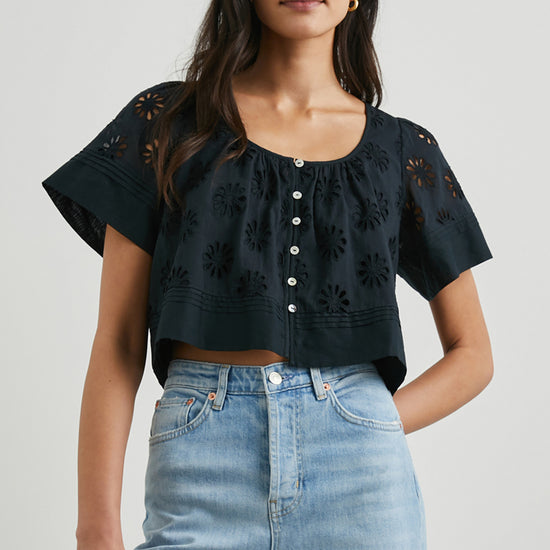 Daisy style broderie anglais top in black with short sleeves and a scoop neck