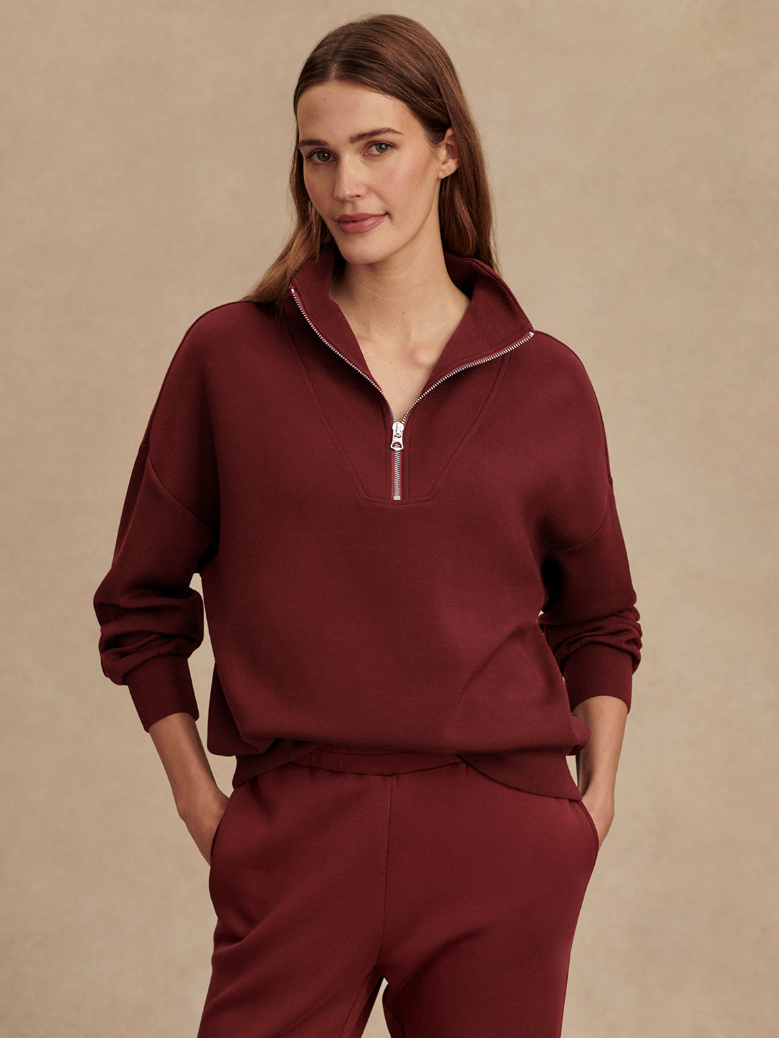 maroon high neck quarter zip jumper with zip detailing and relaxed fit model shot