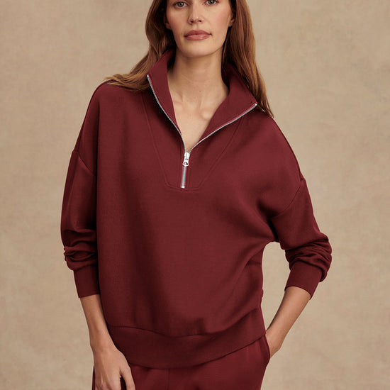 maroon high neck quarter zip jumper with zip detailing and relaxed fit model shot