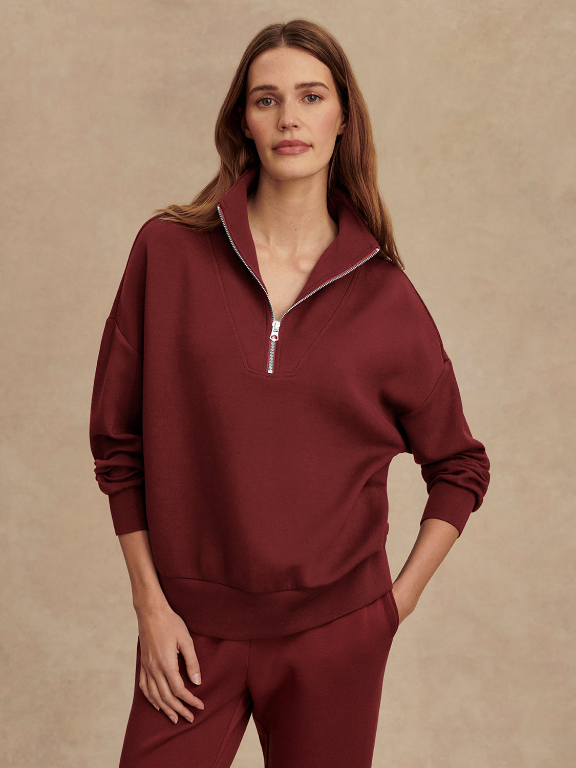maroon high neck quarter zip jumper with zip detailing and relaxed fit model shot