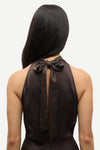 navy blue halterneck dress with open back and tie detail from samsoe samsoe close up of rear 