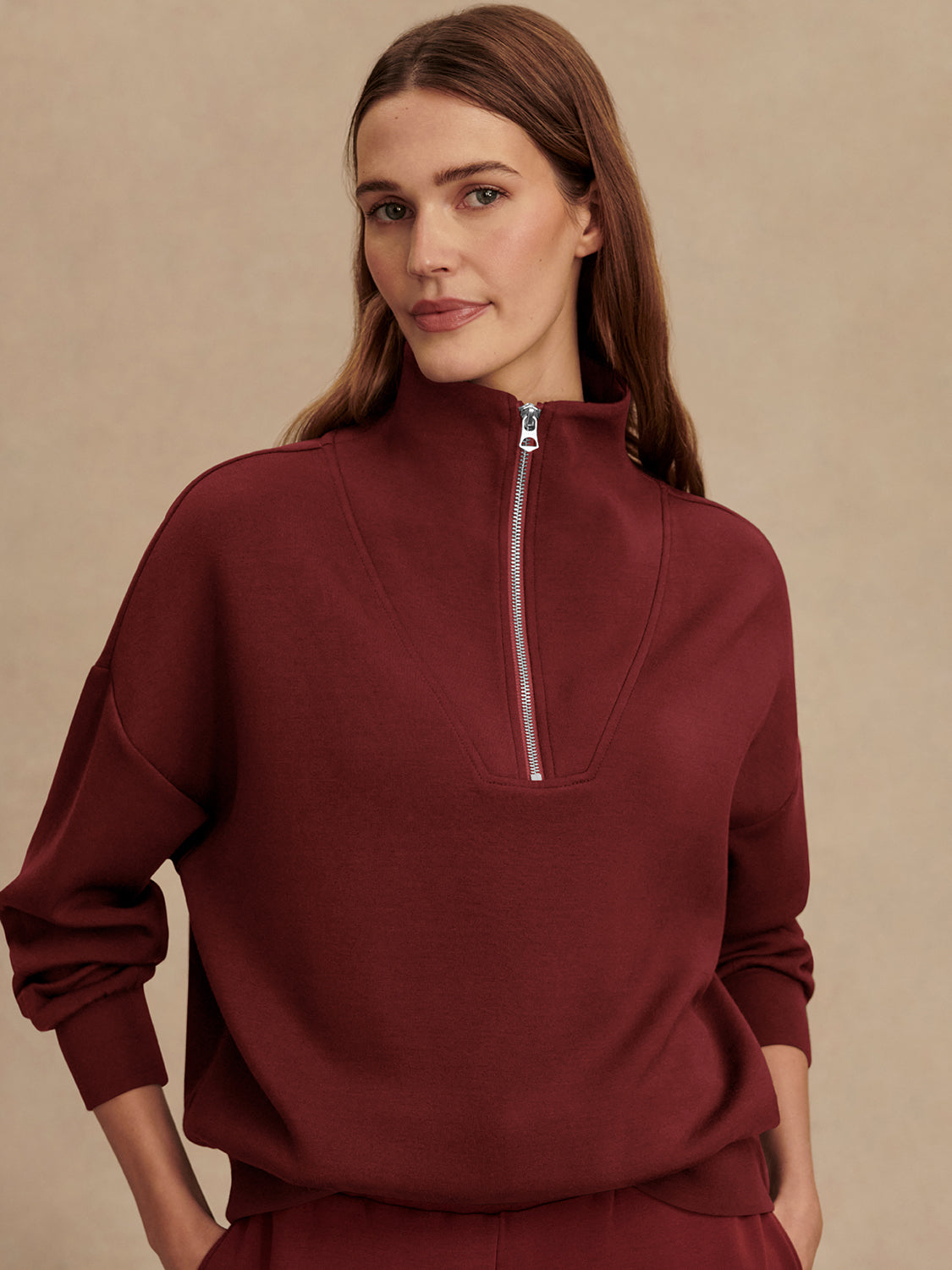 maroon high neck quarter zip jumper with zip detailing and relaxed fit model shot