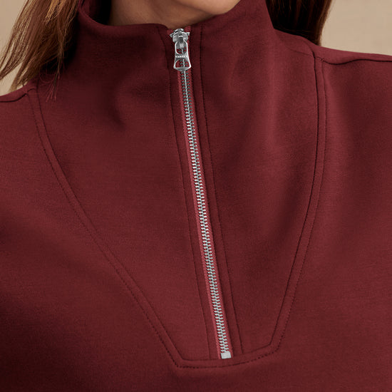 maroon high neck quarter zip jumper with zip detailing and relaxed fit close up
