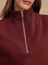 maroon high neck quarter zip jumper with zip detailing and relaxed fit close up