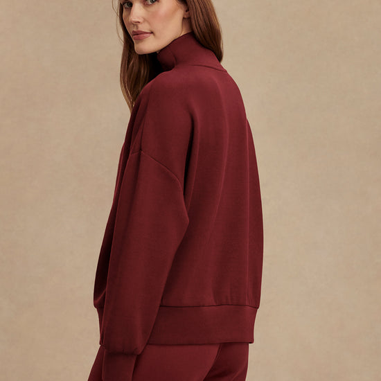 maroon high neck quarter zip jumper with zip detailing and relaxed fit side view