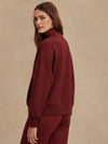maroon high neck quarter zip jumper with zip detailing and relaxed fit side view
