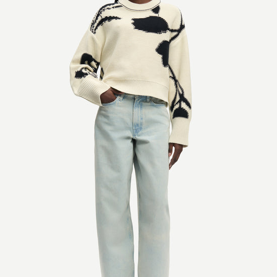 round neck cream cotton jumper with black floral print and ribbed hem, cuffs and neck from samsoe model shot