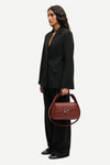 notch lapel black blazer with flap pockets and single button from samsoe side view