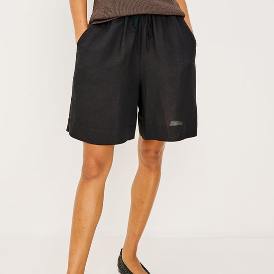 elasticated waist black shorts from rails model