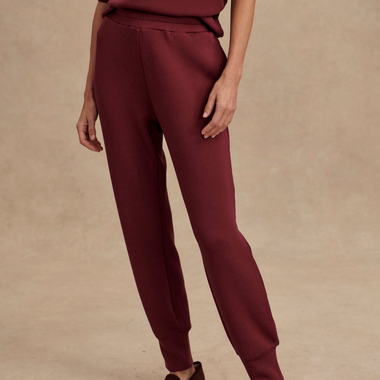 Slim fit maroon coloured sweat pants with ankle cuff and elasticated waistband