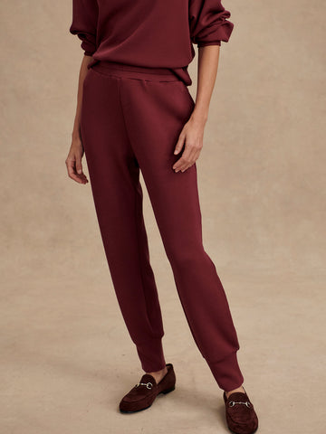 Slim fit maroon coloured sweat pants with ankle cuff and elasticated waistband