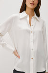 ivory silk shirt with mop buttons and classic collar with fringe detailing model shot