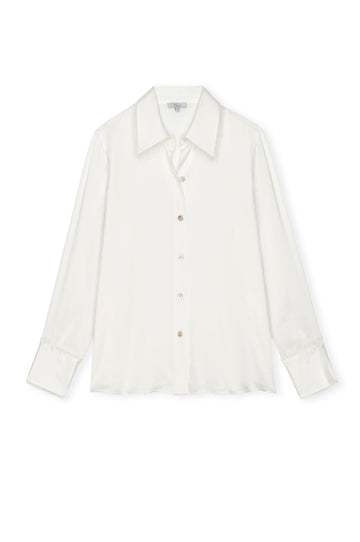 ivory silk shirt with mop buttons and classic collar with fringe detailing