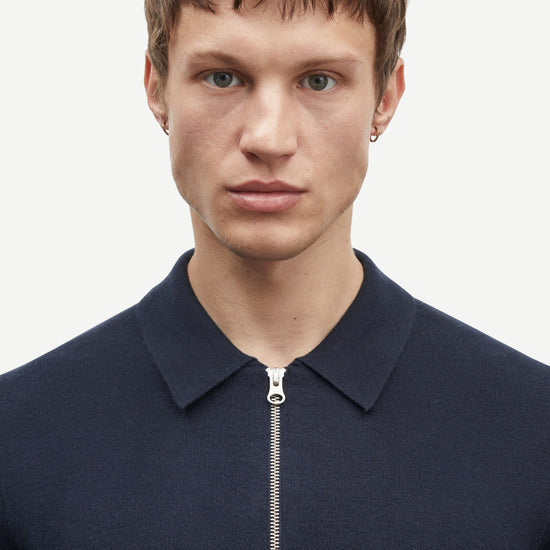 navy half zip jumper with collar and long sleeves in fine knit close up