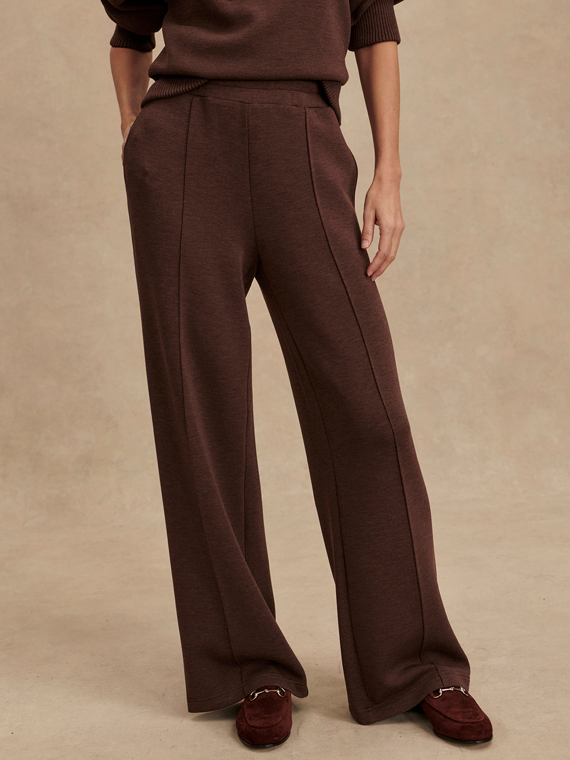 dark brown marl wide leg sweat pants with central seam down the legs and elasticated waistband with side pockets 