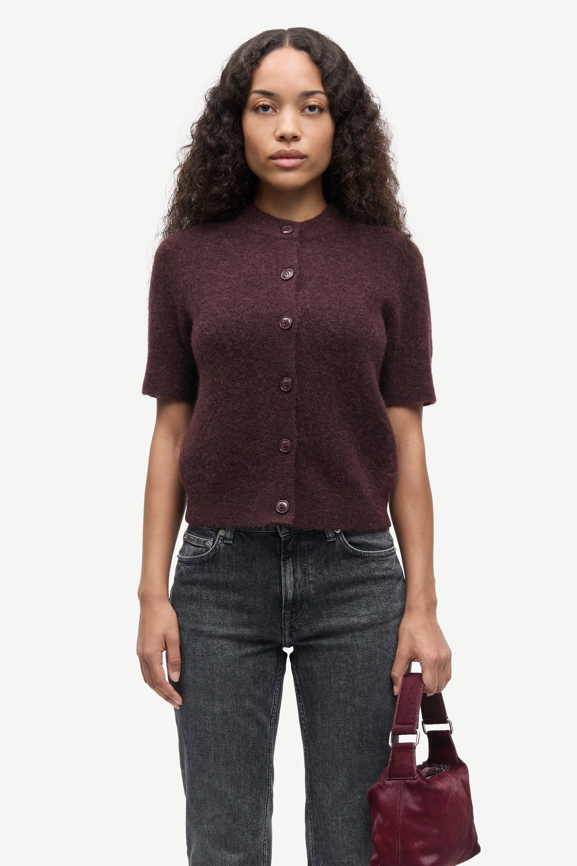 short sleeve dark burgundy wool mix cardigan with burgundy buttons from samsoe samsoe model shot