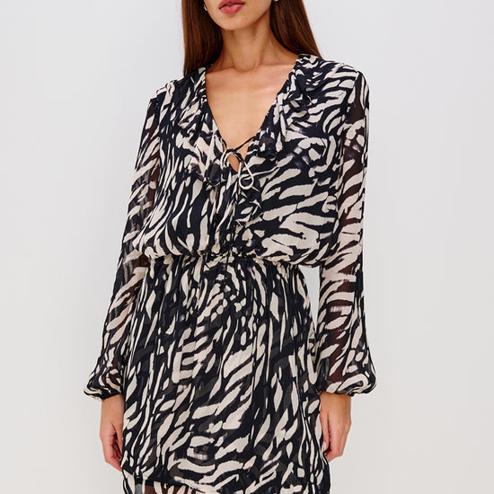 v neck tiger print dress with elasticated long sleeves and tiered skirt model shot