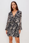 v neck tiger print dress with elasticated long sleeves and tiered skirt model shot