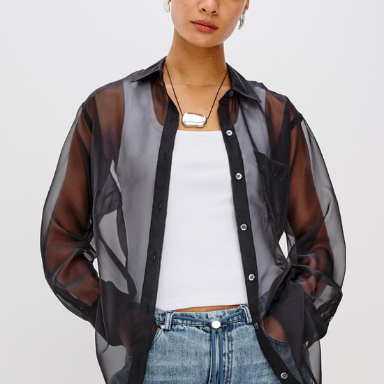 sheer polyester black shirt with chest pocket and long sleeves model shot