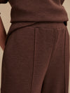 dark brown marl wide leg sweat pants with central seam down the legs and elasticated waistband with side pockets  close up