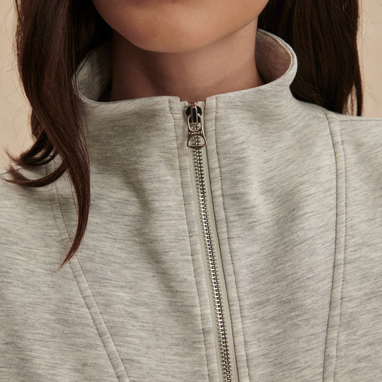 light grey marl double zip sweater with piping from varley  close up
