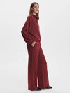 wide leg sweatpants with central front seam, elasticated waist and side pockets side view