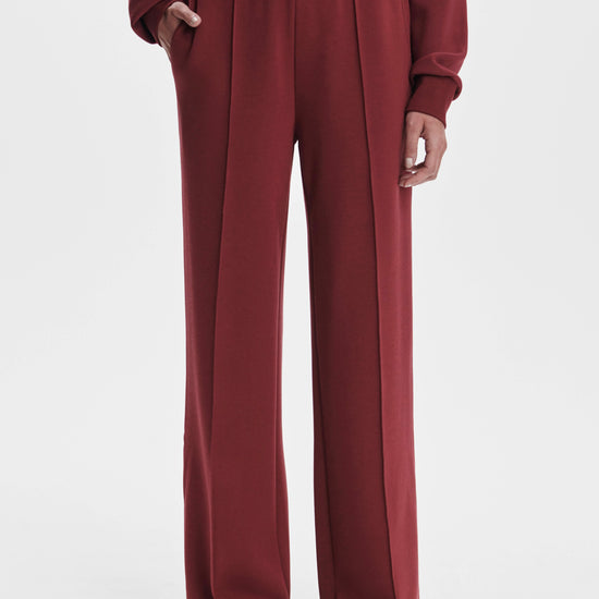 wide leg sweatpants with central front seam, elasticated waist and side pockets