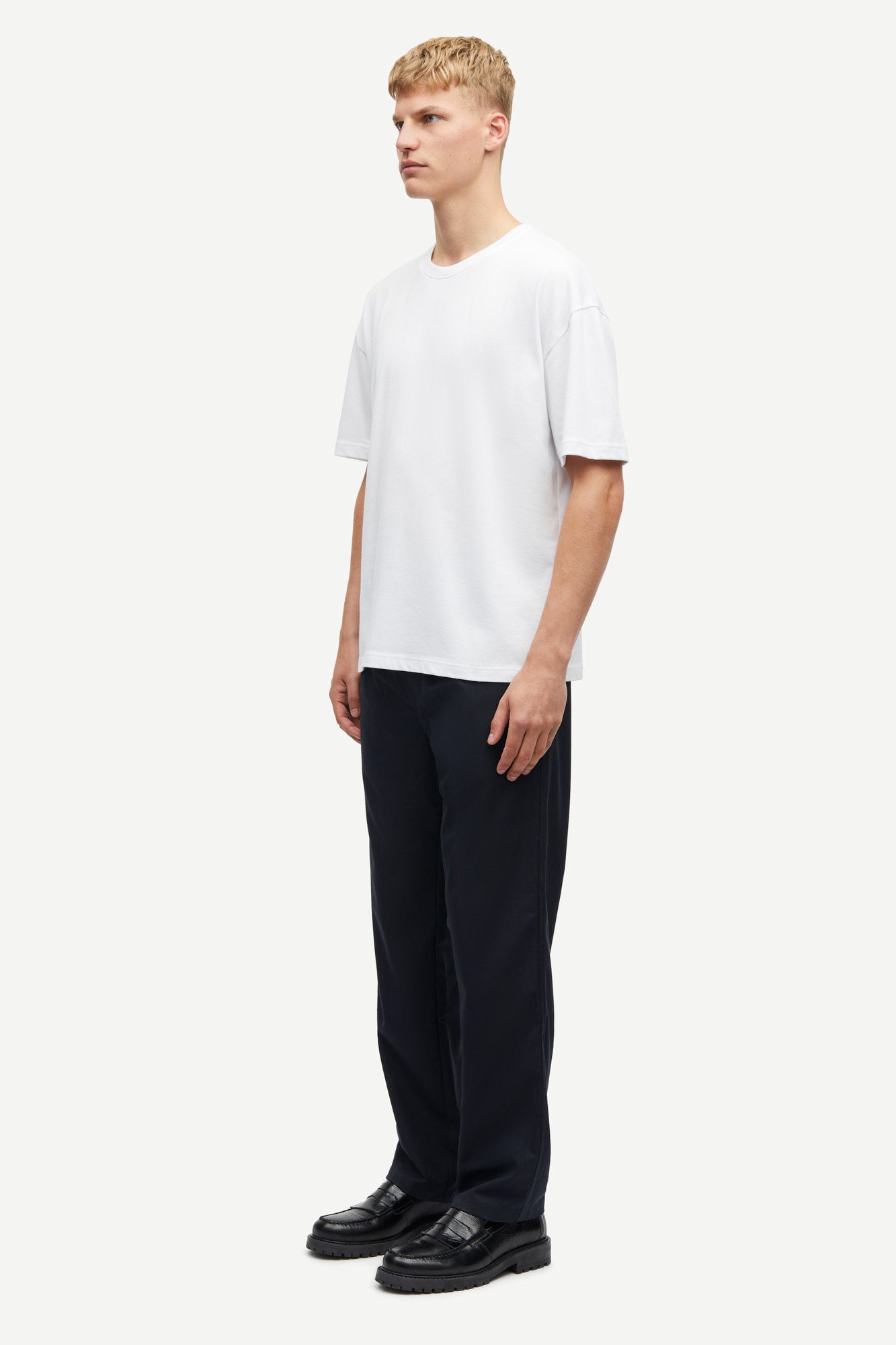 white t-shirt with crew ribbed neck, short sleeves and samsoe samsoe logo  label on side seam 