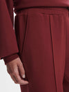 wide leg sweatpants with central front seam, elasticated waist and side pockets close up