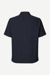 Navy self check shirt on a white background