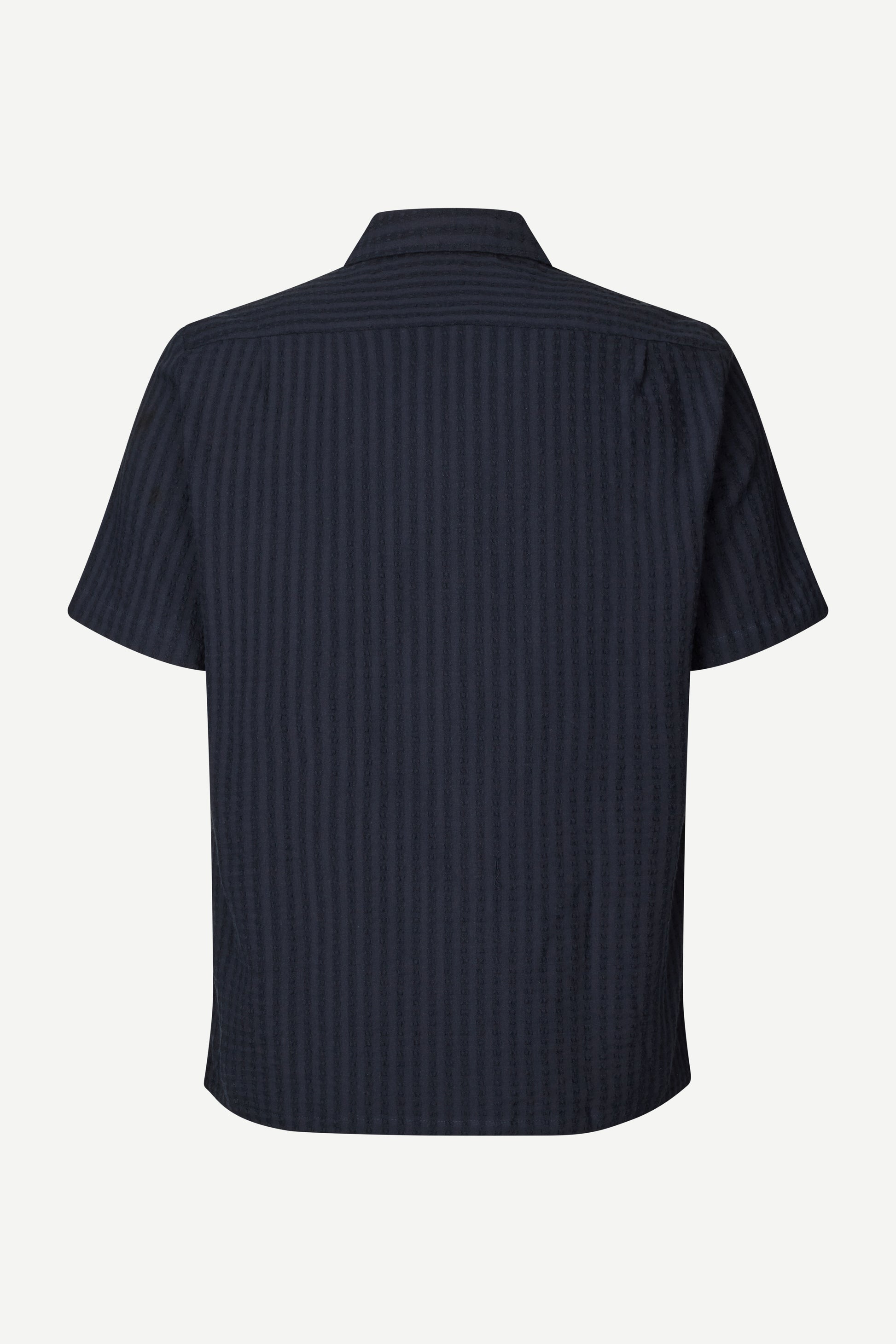 Navy self check shirt on a white background