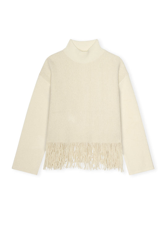 high neck ivory wool jumper with fringe along the hemline 