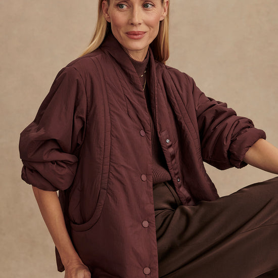 Chocolate brown padded jacket with popper buttons