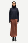 light brown long bias cut satin skirt from samsoe samsoe model shot