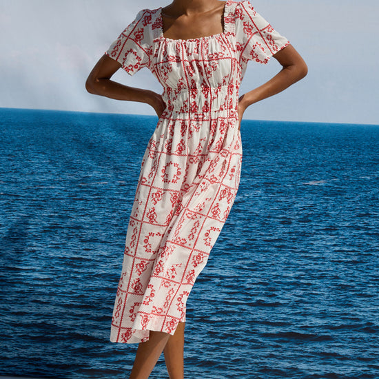 square neck white midi dress with short sleeves and red tile print from rails model shot