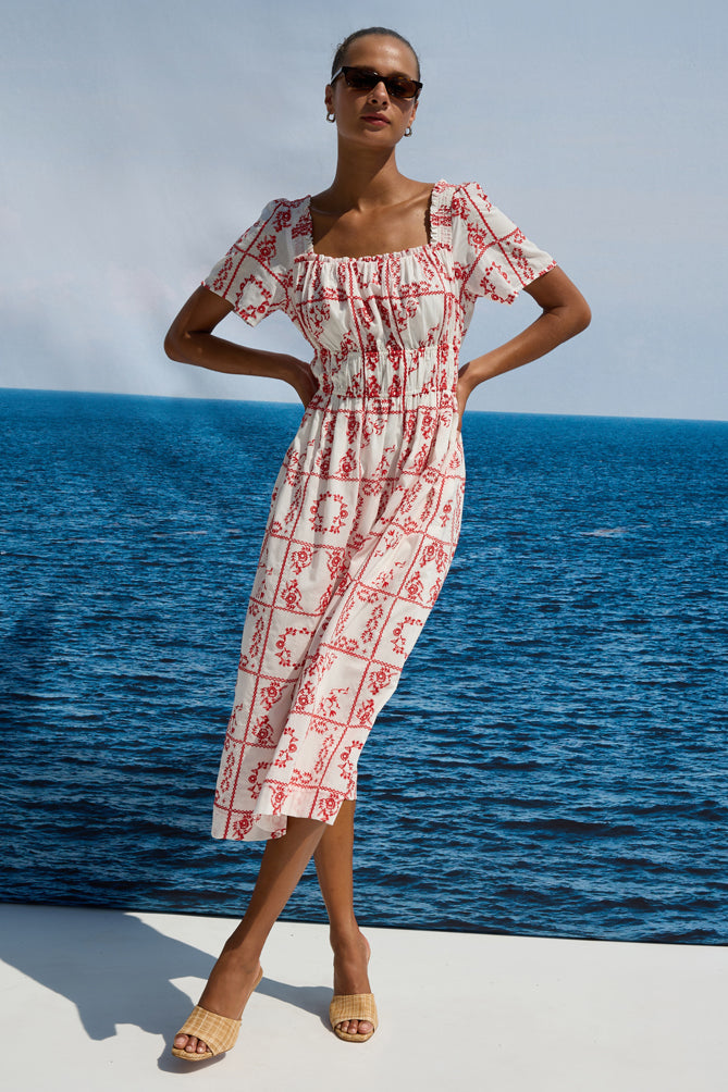 square neck white midi dress with short sleeves and red tile print from rails model shot