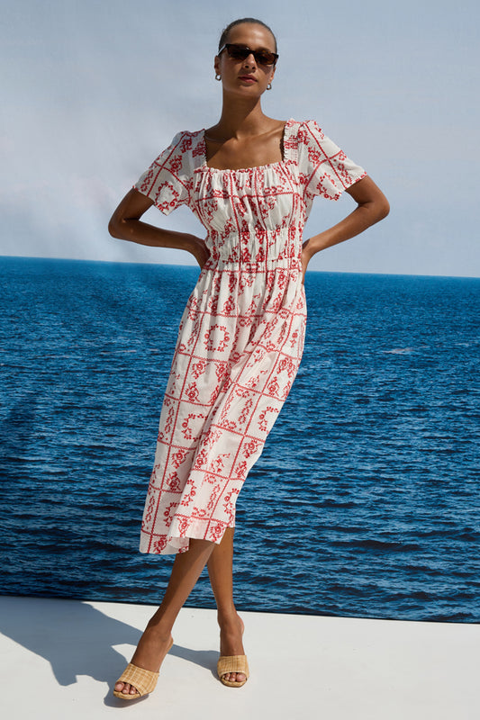square neck white midi dress with short sleeves and red tile print from rails model shot