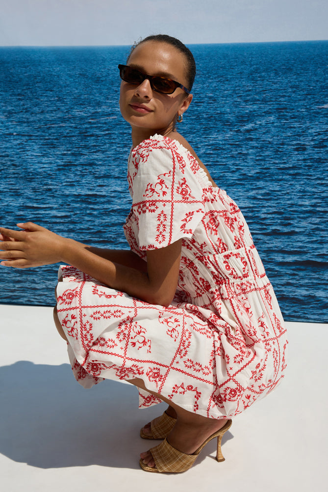 square neck white midi dress with short sleeves and red tile print from rails side view