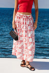 mid length white skirt with elasticated waist and red tile print from rails model