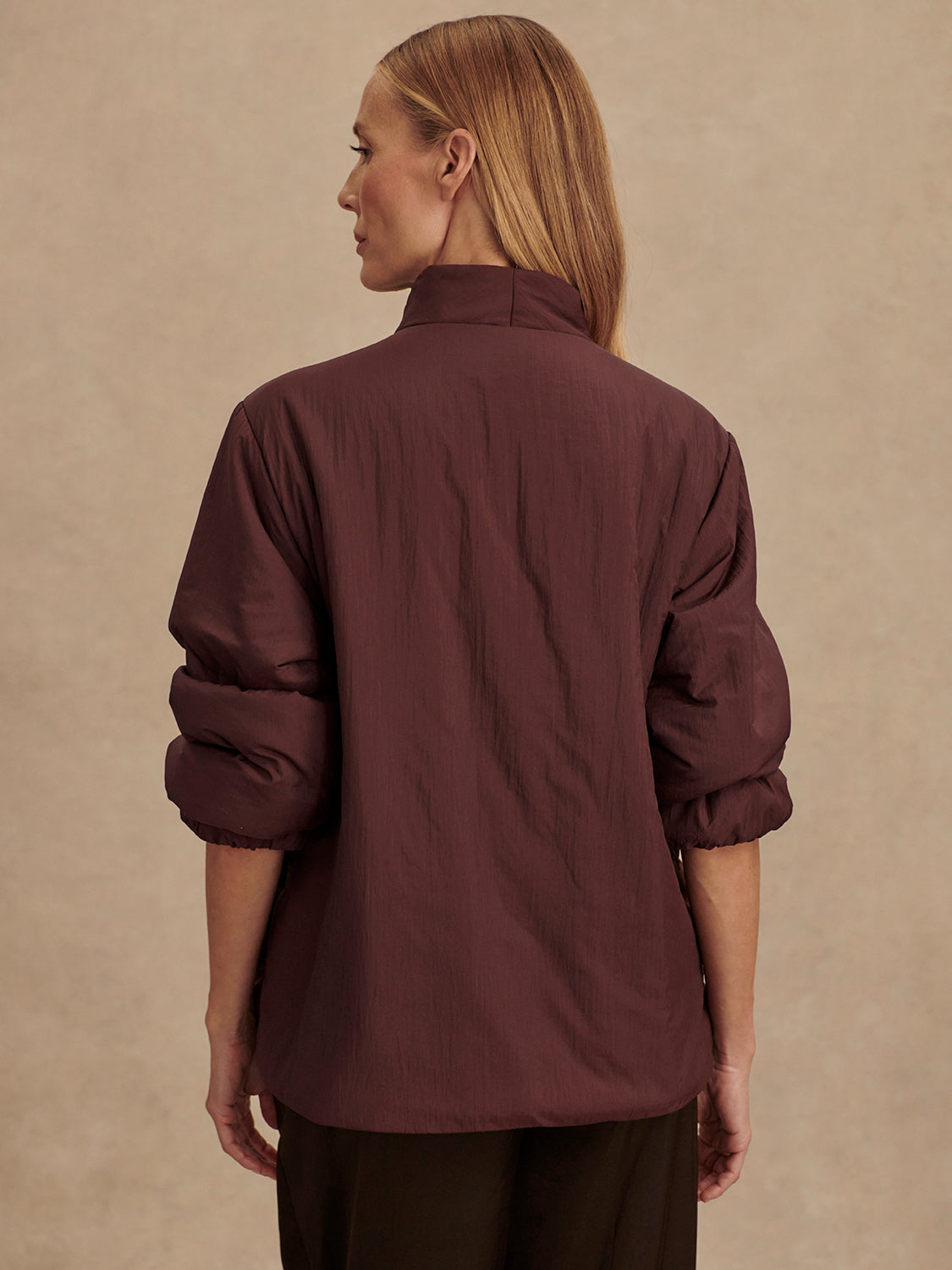 Chocolate brown padded jacket with popper buttons rear view 