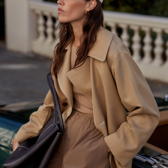 short camel trench coat with tie belt from varley model shot