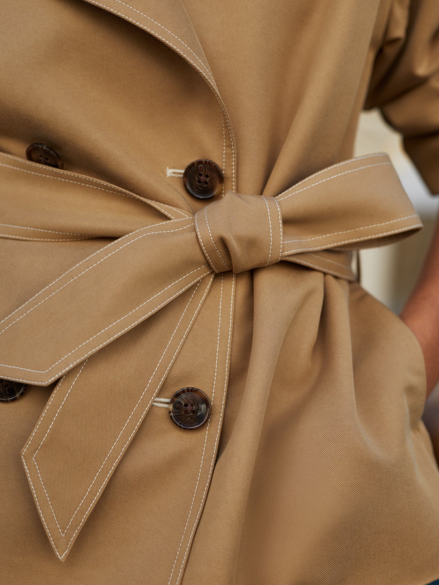 short camel trench coat with tie belt from varley close up