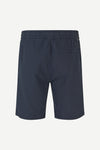 Navy blue shorts on a white background