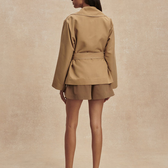 short camel trench coat with tie belt from varley rear view 