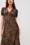 v neck short sleeve mid length animal print dress close up
