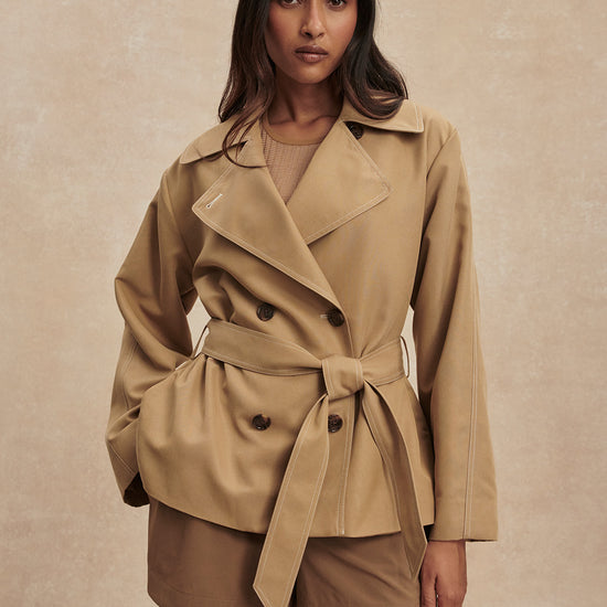 short camel trench coat with tie belt from varley model shot