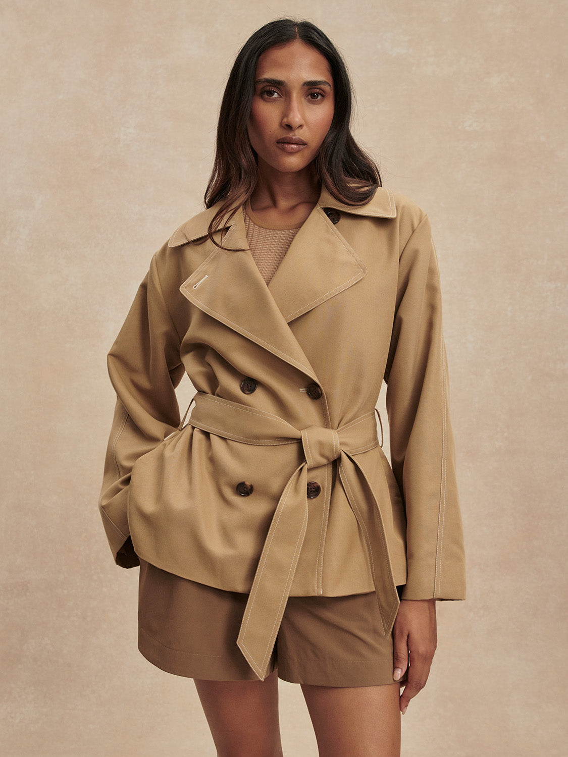 short camel trench coat with tie belt from varley model shot