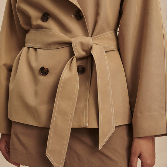 short camel trench coat with tie belt from varley close up